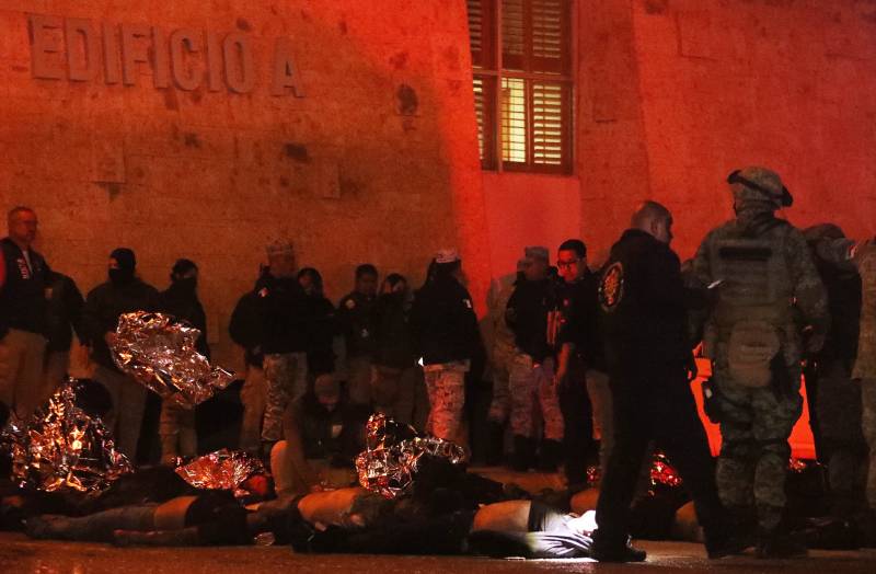 Firefighters and Mexican soldiers rescue migrants from an immigration station in Ciudad Juarez, Chihuahua state. AFP