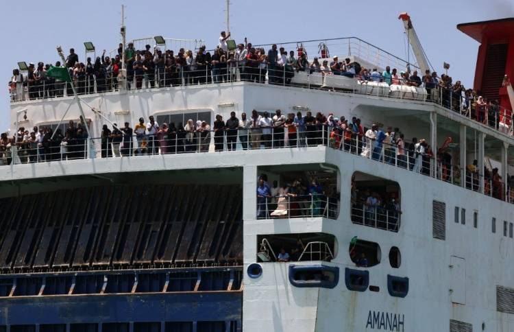 A ferry transports some 1900 evacuees across the Red Sea from Port Sudan to the Saudi King Faisal navy base in Jeddah, on April 29, 2023, during evacuation efforts of people fleeing Sudan. Warplanes on bombing raids drew heavy anti-aircraft fire over Khartoum as fierce fighting between Sudan's army and paramilitaries entered a third week, despite a renewed truce. AFP 