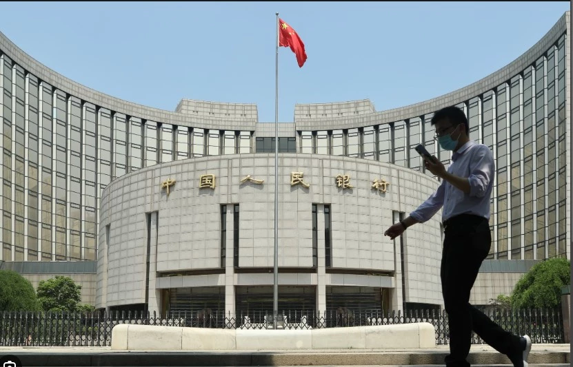 China central bank cuts key interest rate to boost economy