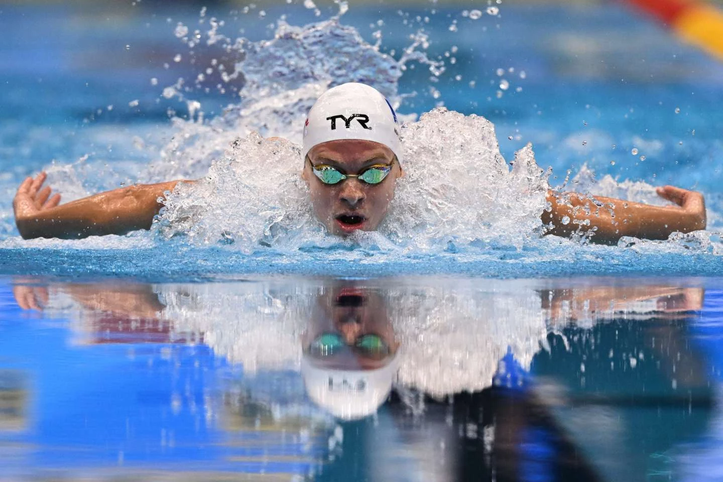France's Marchand wins 200 IM world title for third gold