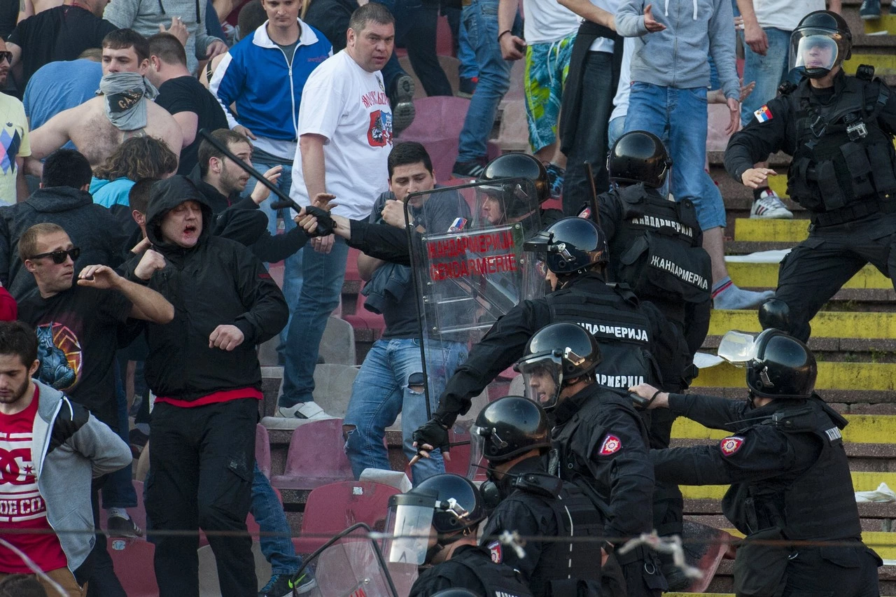 Over 100 to face Greek prosecutor over deadly football fan violence