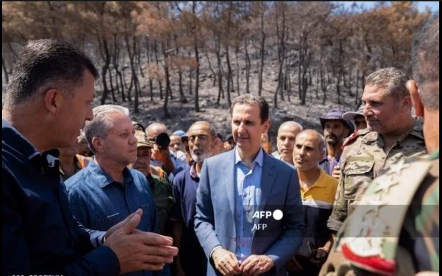 Syria doubles pay for civil servants, military personnel