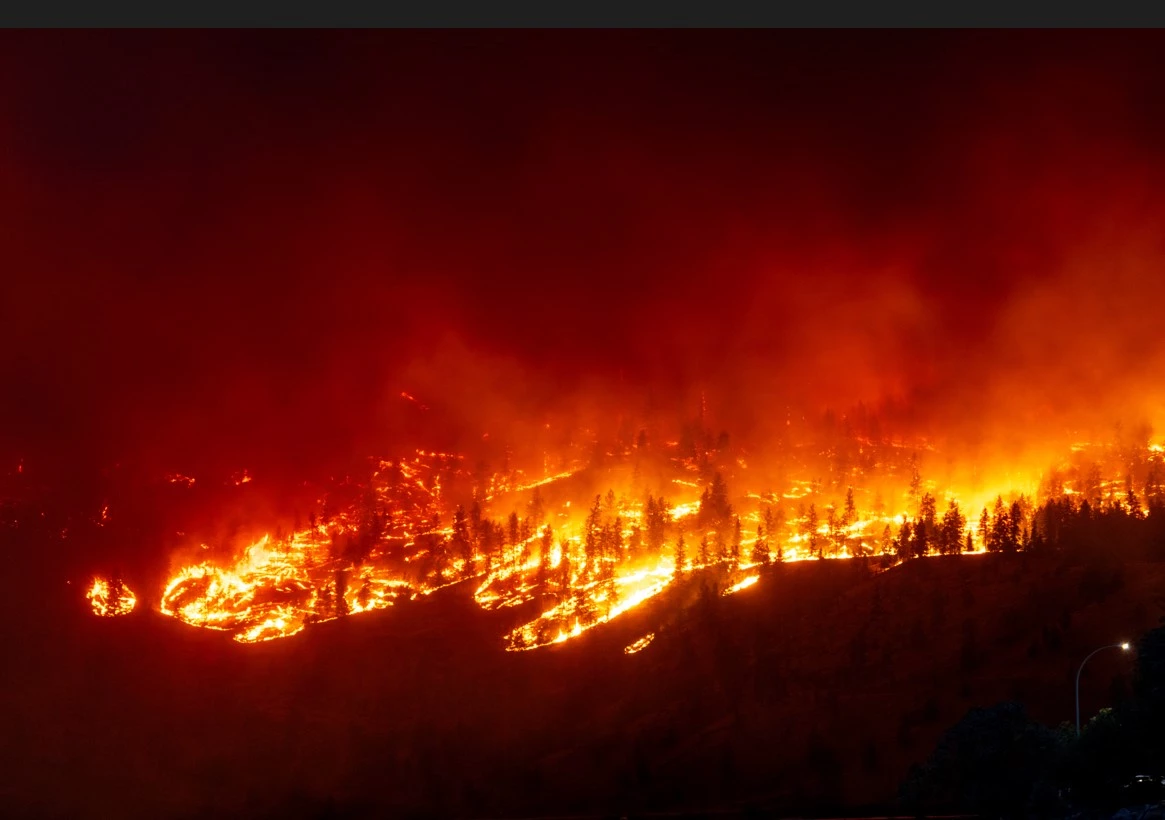 Fires in Canada's north force another town to evacuate