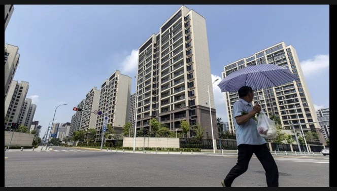 Chinese real estate developer Country avoids default