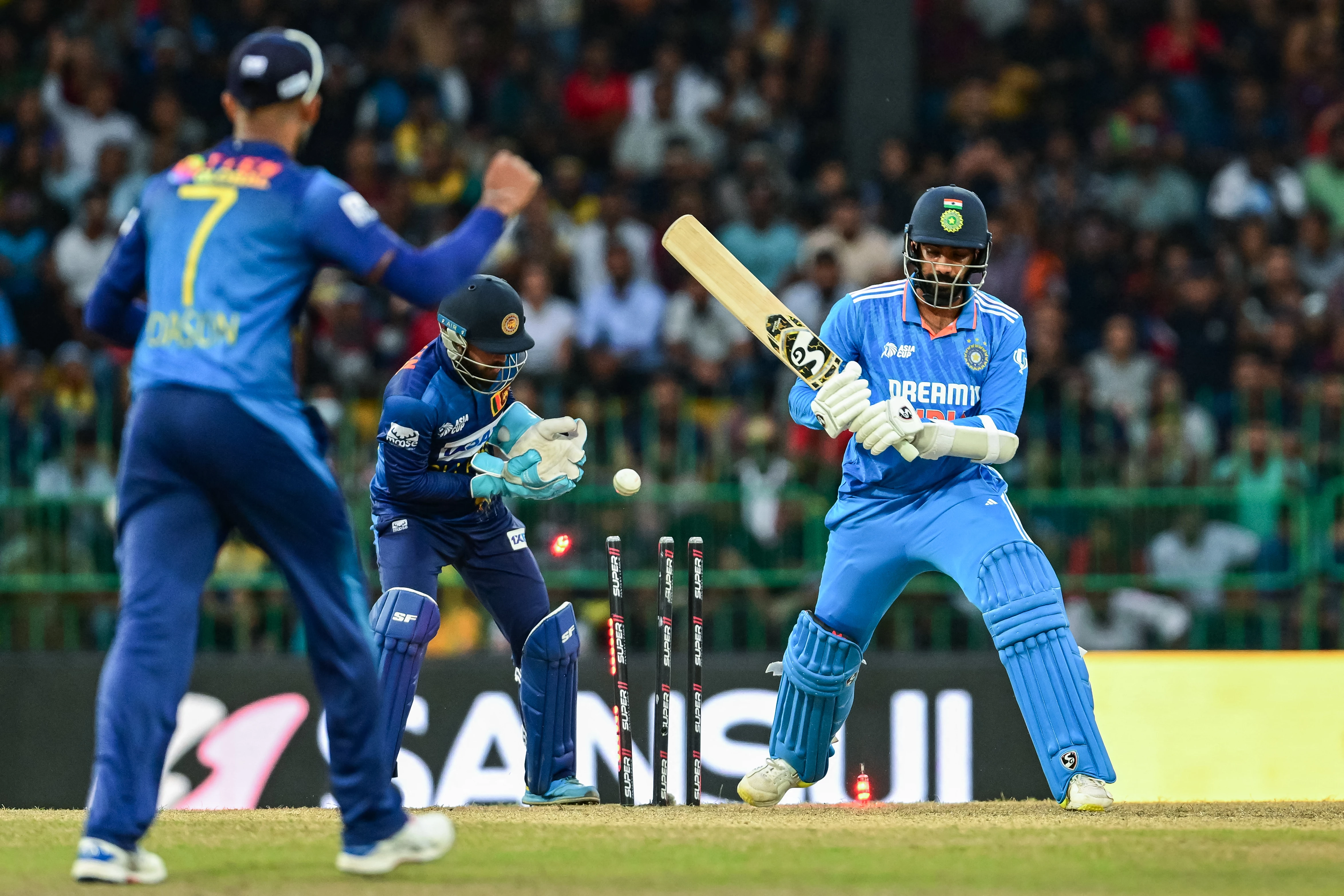 Sri Lanka's Wellalage, Asalanka spin out India for 213