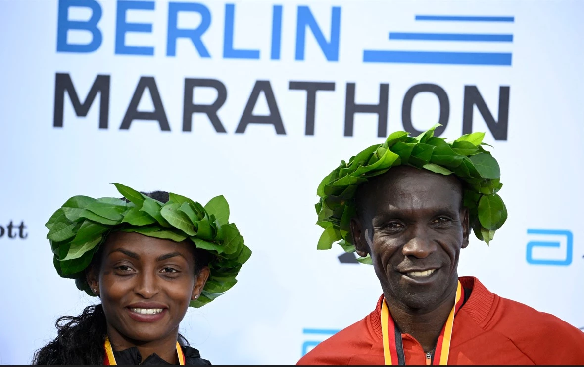 Assefa smashes women's marathon world record in Berlin, Kipchoge wins men's race