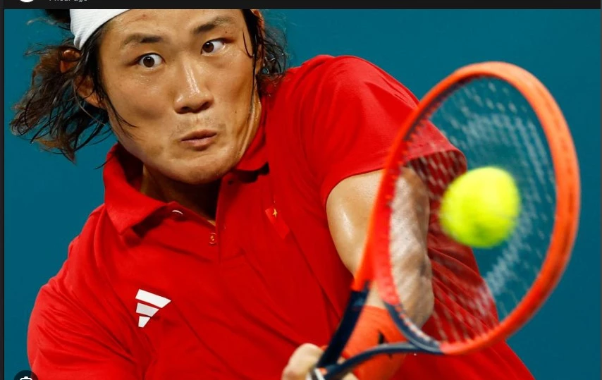Zhang fights back to win Asian Games tennis gold