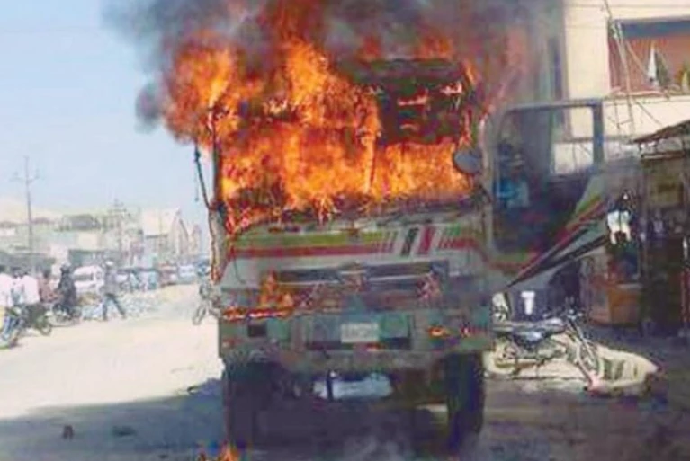 Fire reduces cotton-laden truck to ashes