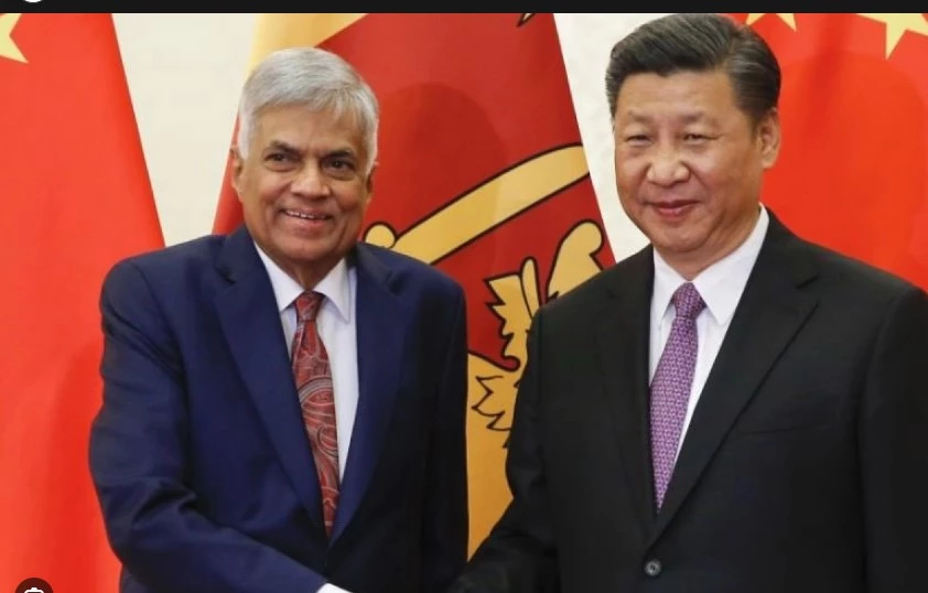Xi tells Sri Lankan president China to boost 'trust' after debt deal