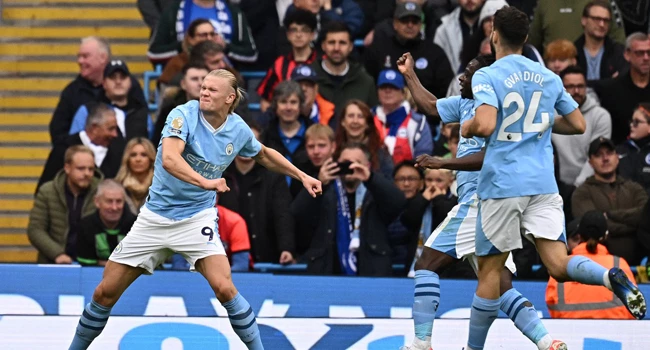 Man City return to Premier League summit after Liverpool win derby