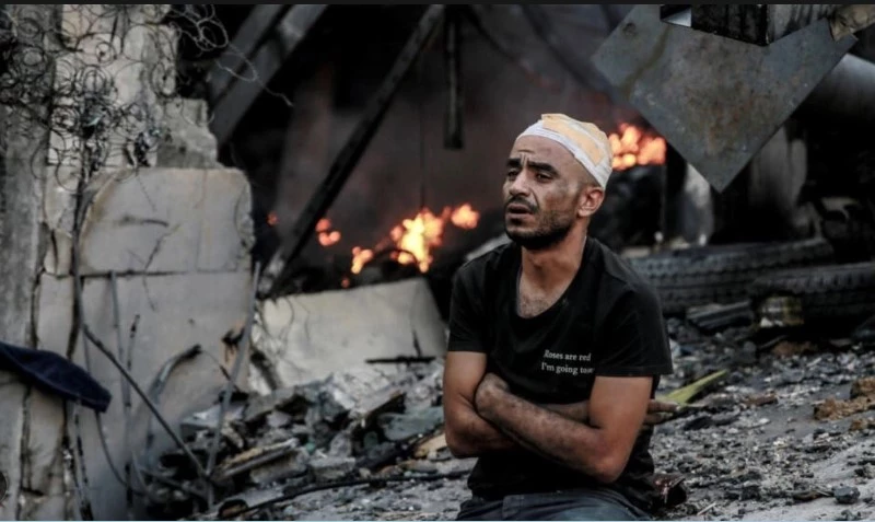 Israel ground forces raid central Gaza as war enters 21st day