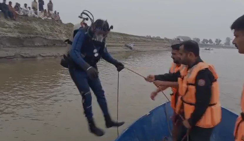 Brother rescued from river, another still missing