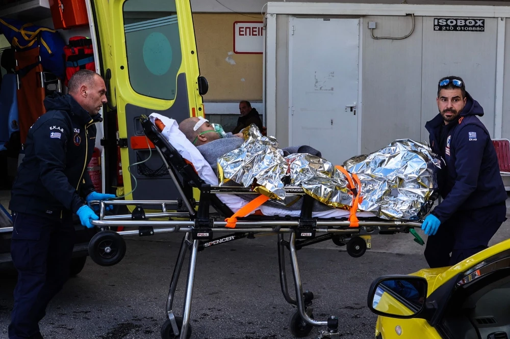 Search underway for 13 missing after ship sinks off Greek island