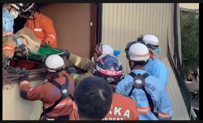 Elderly woman pulled from rubble five days after Japan quake