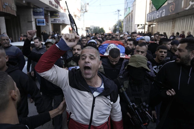 Palestinians say Israeli forces drove over body of militant