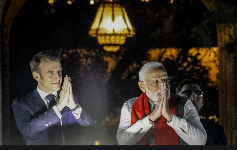 India fetes France's Macron at annual military parade