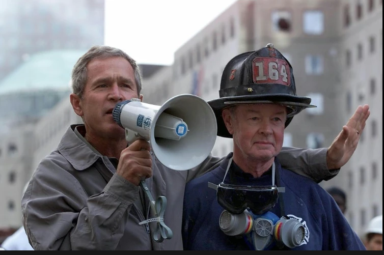 9/11 firefighter who stood next to Bush in iconic photos dead at 91