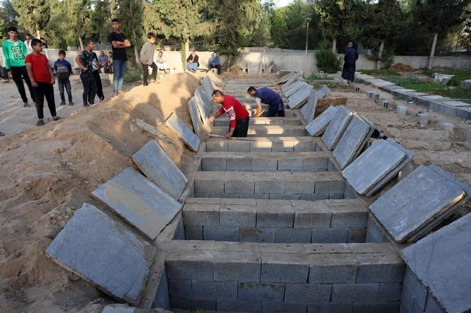 Health ministry in Hamas-run Gaza says war death toll at 30,878