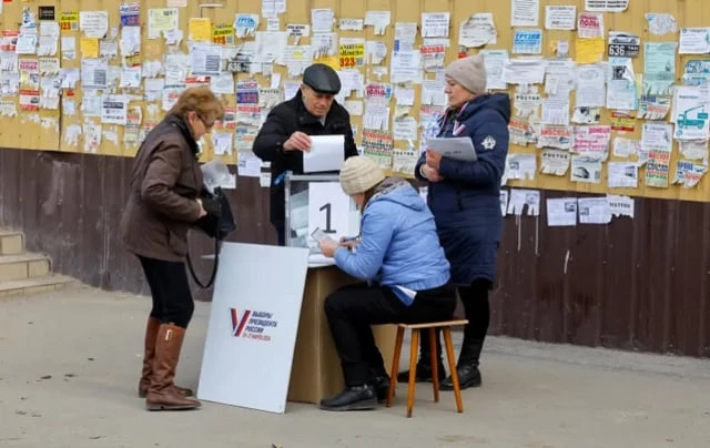 Russia and Ukraine down drones as voting starts