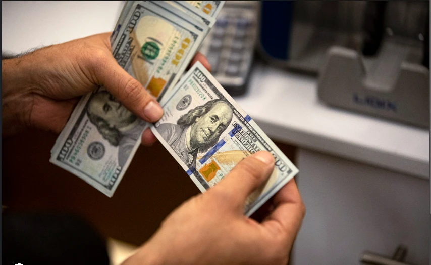 US Fed holds key rate, still sees 3 cuts in 2024