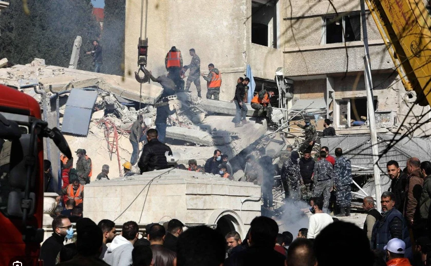 Syria strikes kill 17 including Iran Guard, WHO worker