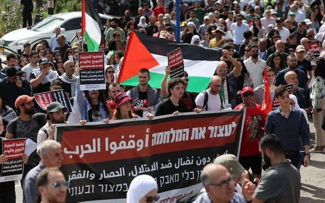 Thousands in Israel call for end to Gaza war on Palestinian Land Day