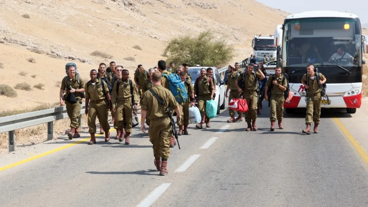 Israeli army says school bus attack gunman gives himself up