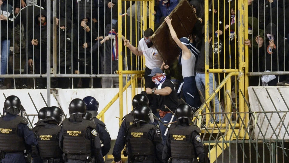 Dozens arrested after fans and police clash at Croatia Cup semi-finals