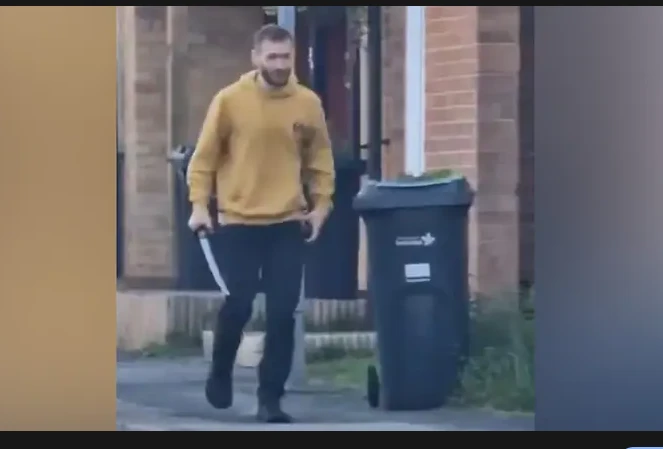 Sword-wielding man held in east London after attacks