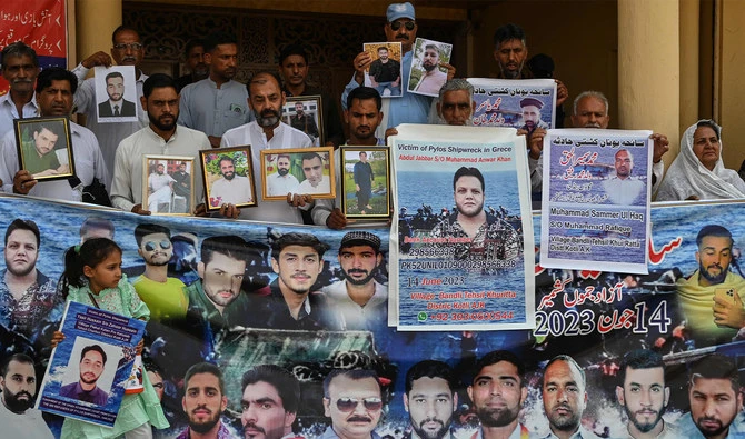 A year after migrant shipwreck, bereaved determined to leave Pakistan