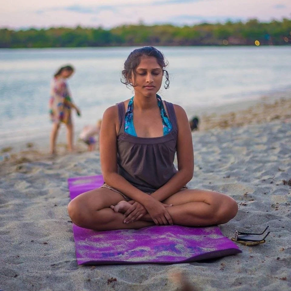 Karachites observe International Yoga Day at beach