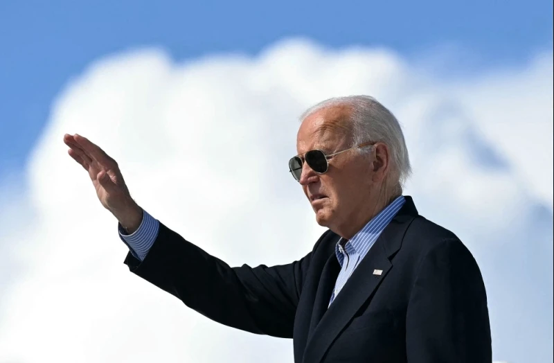 Biden back on campaign trail as pressure mounts