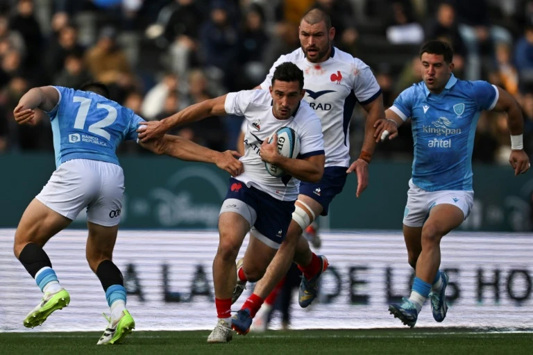 Scandal-hit France ease past Uruguay