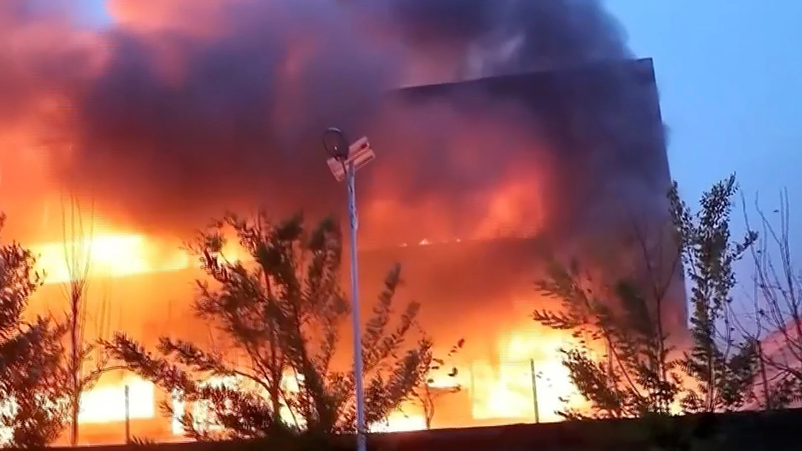 Fire extinguished at China mall, people trapped inside: state media