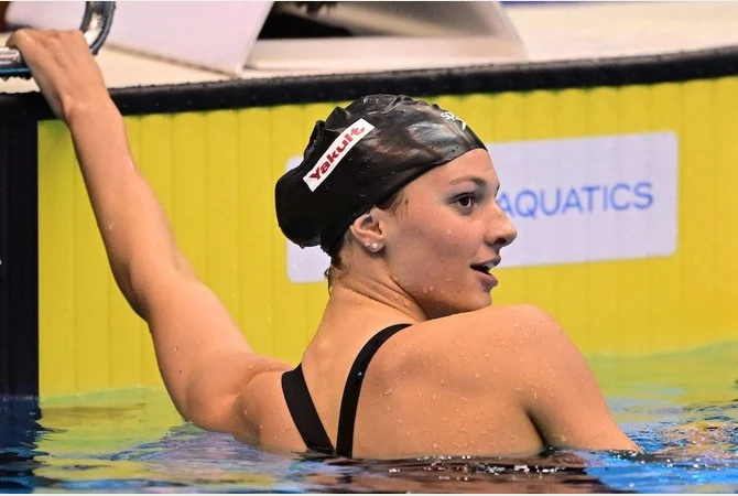 Teen swim star McIntosh 'soaking up the moment' after first Olympic gold