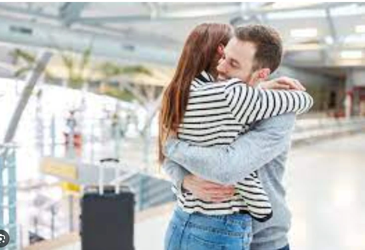 New Zealand airport sets three-minute limit on hugs