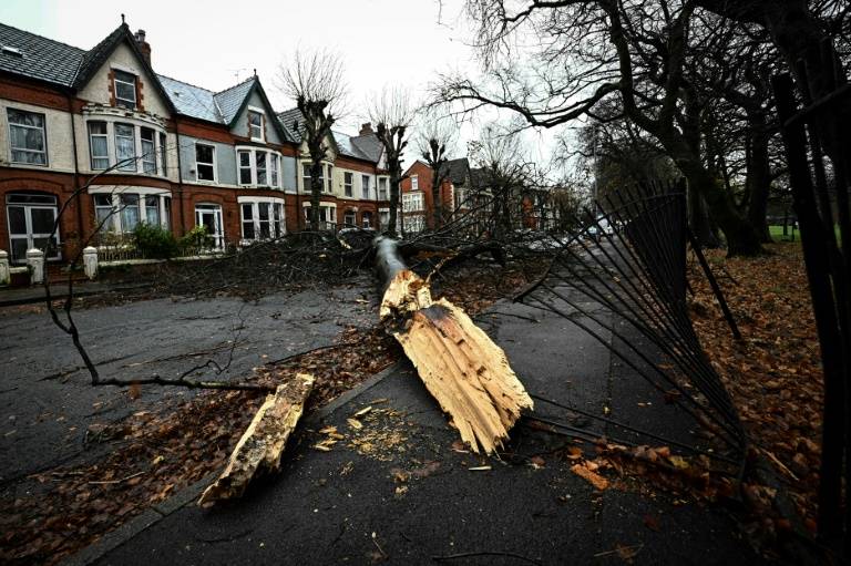 Power cuts and two dead as Storm Darragh batters UK