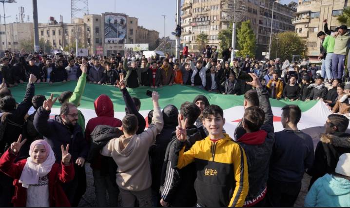 Syria's new rulers call for victory celebrations in streets
