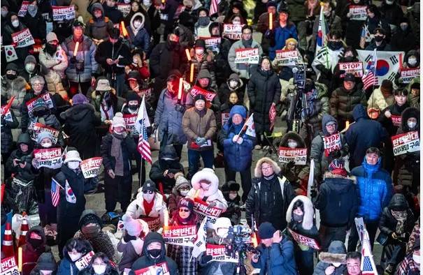 Hundreds rally for South Korea's Yoon as new arrest bid beckons