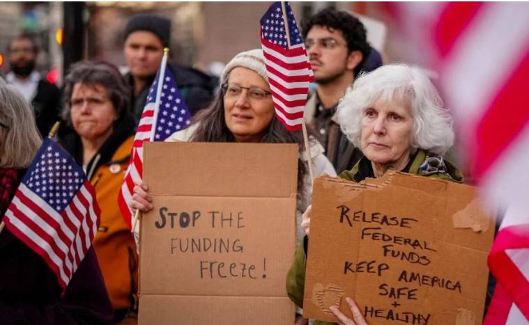 Trump offers federal workers exit package as funding freeze sows chaos