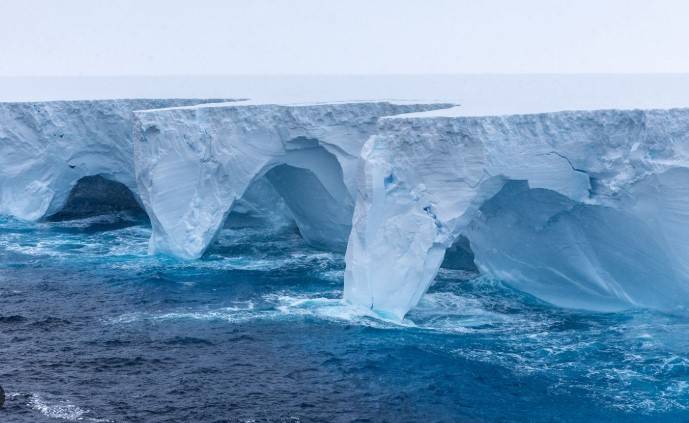 First major chunk breaks off world's biggest iceberg