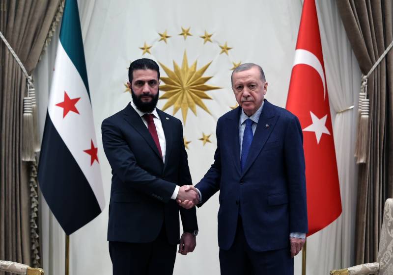 Syria's new leader holds talks with Erdogan in Turkey