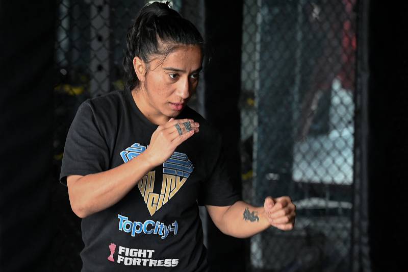 Pioneering Pakistan woman MMA fighter breaks barriers... and arms