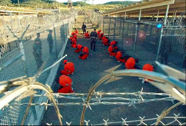 Pentagon says 10 'high-threat' migrants being held at Guantanamo