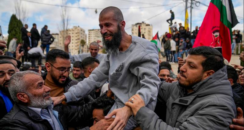 Palestinian prisoners released from jail, but not free to celebrate