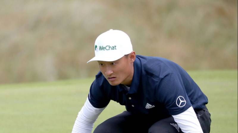 Li stays cool on last to win Qatar Masters