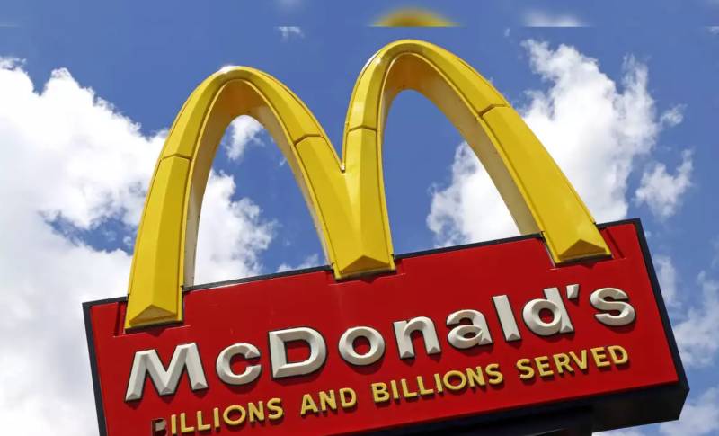 McDonald's profits dented by food poisoning outbreak
