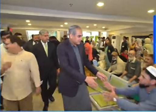 Mohsin Naqvi activates new passport counter at mega Nadra Centre in Karachi