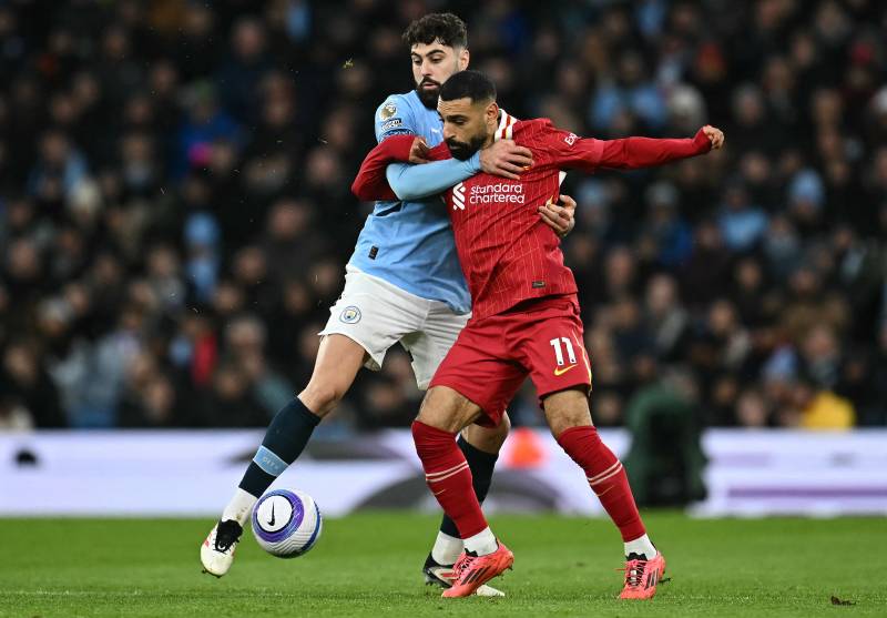 Salah-inspired Liverpool beat Man City