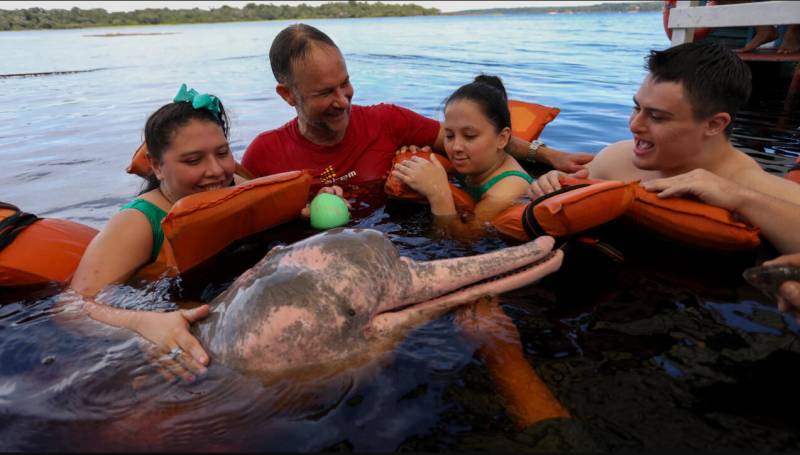 In Brazil's Amazon, dolphin therapy aids people with disabilities